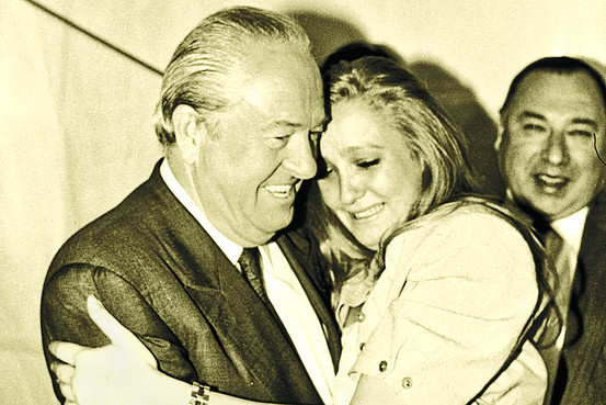 Le Pen (right) with her father, Jean-Marie, in 1988.