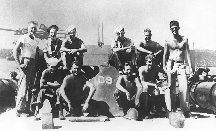 PT-109_crewJohn F. Kennedy, USNR, (standing at right)