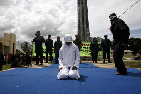 Whipping punishment to Acehnese woman